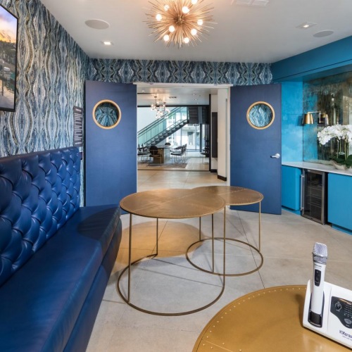 The essence of exceptional living a room with blue walls and a table and a couch