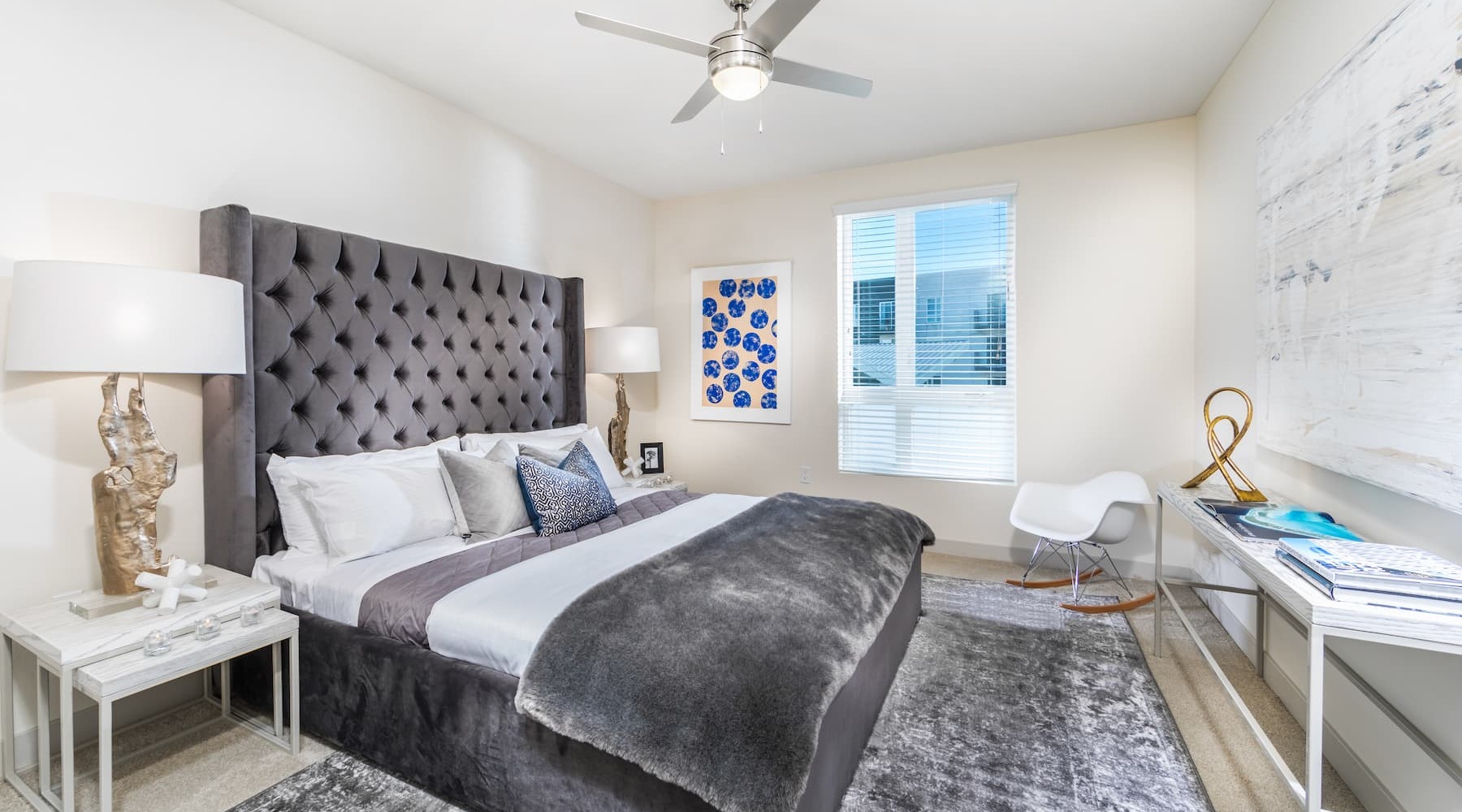 Style and social spaces in abundance. bedroom decor and modern-neutral colored sheets and pillows